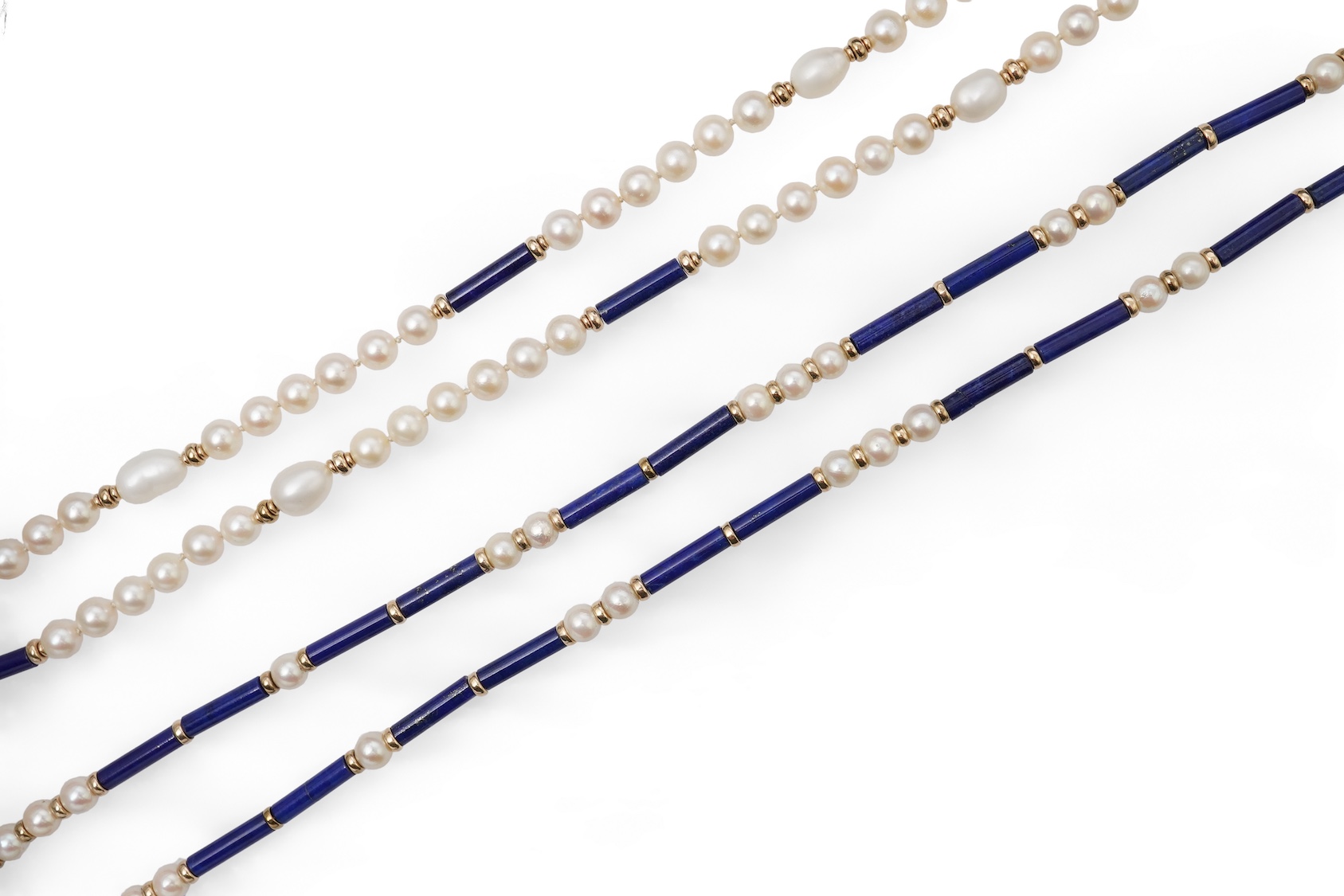 Two cultured pearl, lapis lazuli and gold necklaces, each composed of lapis lazuli batons and cultured pearls, with gold spacers, lengths 77.5cm and 64cm